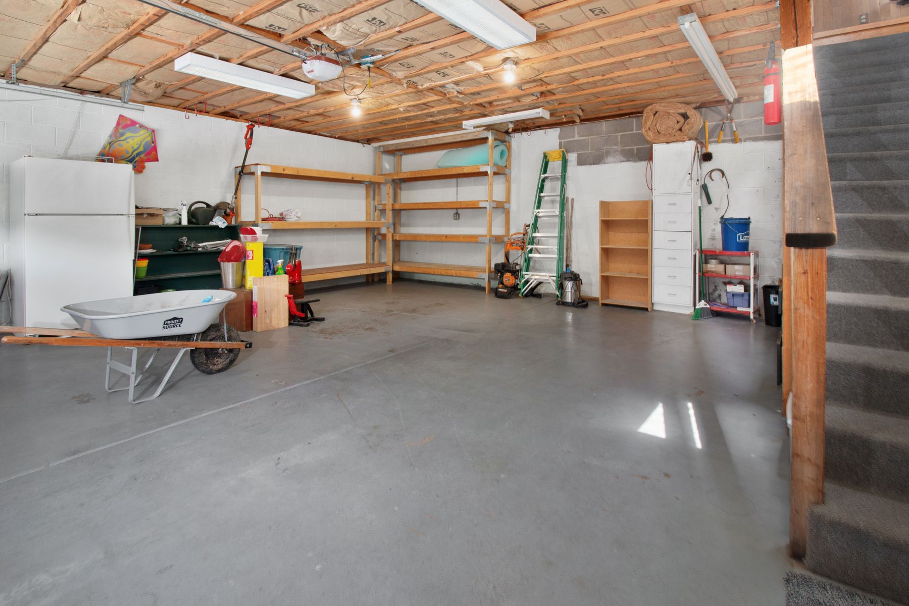 Bare concrete garage floor before coating
